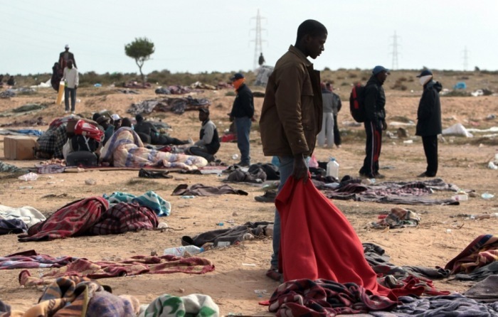 Migranten in einem tunesischen Lager nahe der libyschen Grenze. Archivbild: epa-efe/Jim Hollander